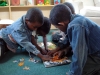 Most children had never put together a puzzle before,  but these boys quickly picked up the skills.