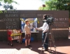 Zanne Macdonald, a librarian at Jefferson-Madison Regional Library in Charlottesville, Virginia, answers questions for the local media about the library's display at a downtown Free Speech Wall.