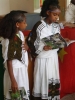 Children of Mekele read for assembled dignitaries.