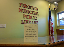 Sign inside Ferguson (Mo.) Public Library