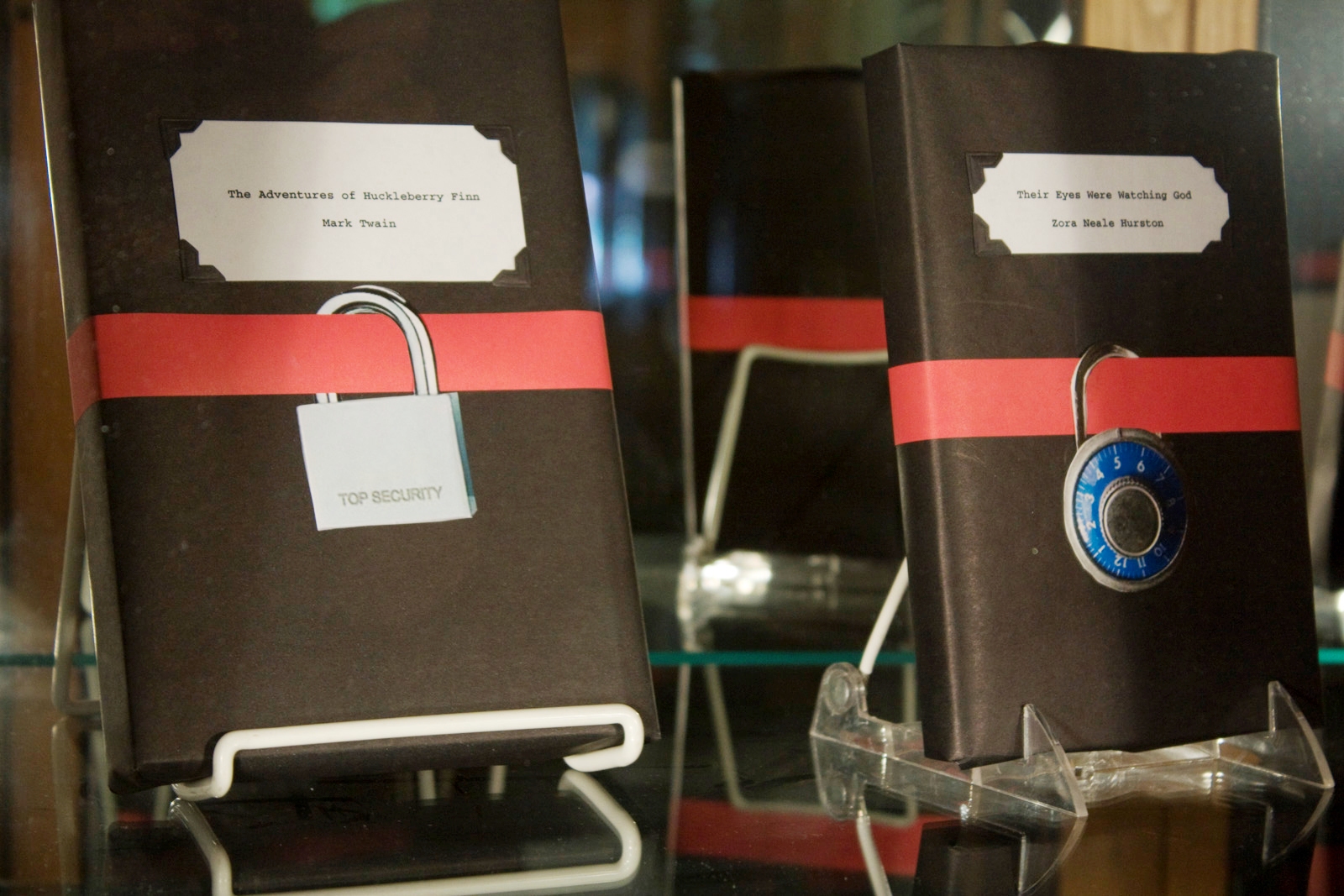 Books are under imaginary lock-and-key in a display at Columbia College Library in Chicago.