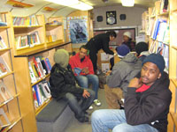 Inside the Queens Library Book Bus, people from Rockaway Peninsula take shelter. Photo courtesy of Queens Library