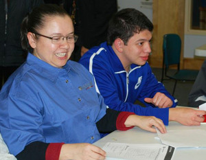 Gloria Velez and her son, Mauricio, volunteer as promotores to help bring new patrons to Waukegan (Ill.) Public Library <span class="credit”>Photo: Waukegan Public Library</span>