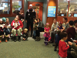 Children participate in "Keep Me Safe Storytime" with their parents at Beebe Memorial Library.