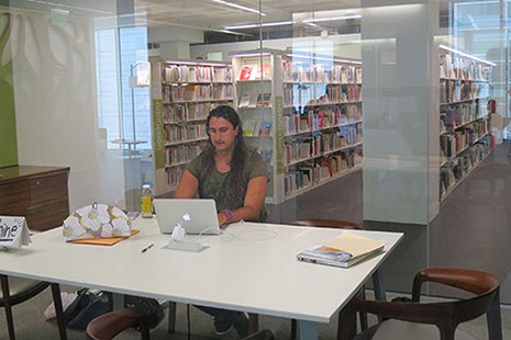 Z! Haukeness from the Shine Initiative—a nonprofit based in Madison, Wisconsin—keeps a prominent profile in a glass room in the middle of Madison Public Library, where he and a coworker spend 30 hours a week helping patrons find housing and jobs and apply for food stamps. Some people come just to talk through hardships, he says.