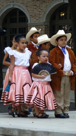 Children from Franklin Elementary’s Ballet Folklorico perform a Norte dance for LibroFest at Houston’s Central Library Plaza.