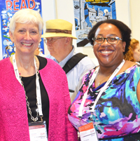 ALA President Barbara K. Stripling (left) and ALA President-Elect Courtney L. Young at the IFLA Exhibits. Photo by Carlon Walker