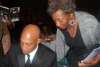 Ray Charles Robinson Jr. signs an autograph for Friends of the Birmingham Public Library President Cora Sims after the President's Gala.