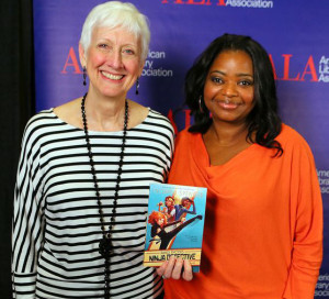 Actor Octavia Spencer (right) with ALA President Barbara K. Stripling. Spencer is holding a copy of her new children's book.