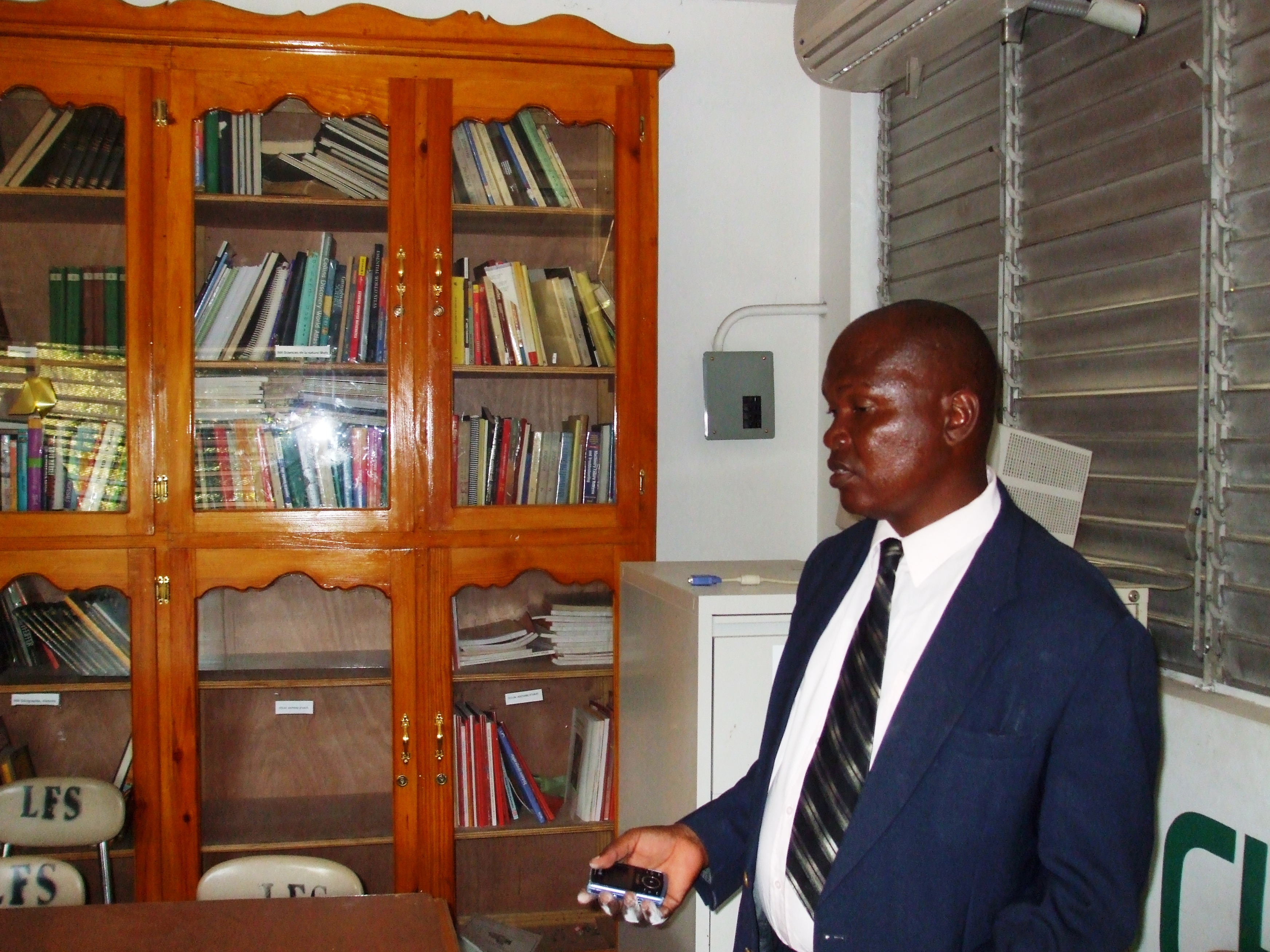 Books are precious and kept under lock and key in the library of the Faustin Soulouque high school in Petit-Goâve, says Principal Louis Frantz Batista.