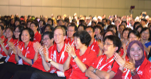 Volunteers celebrate a week’s work well done. Photo by Carlon Walker