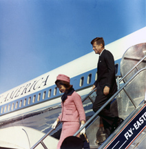 President Kennedy and the First Lady exit Air Force One.