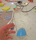 Making a paper speaker out of Post-it Notes, copper wire, and a magnet. Photo by Laurie D. Borman