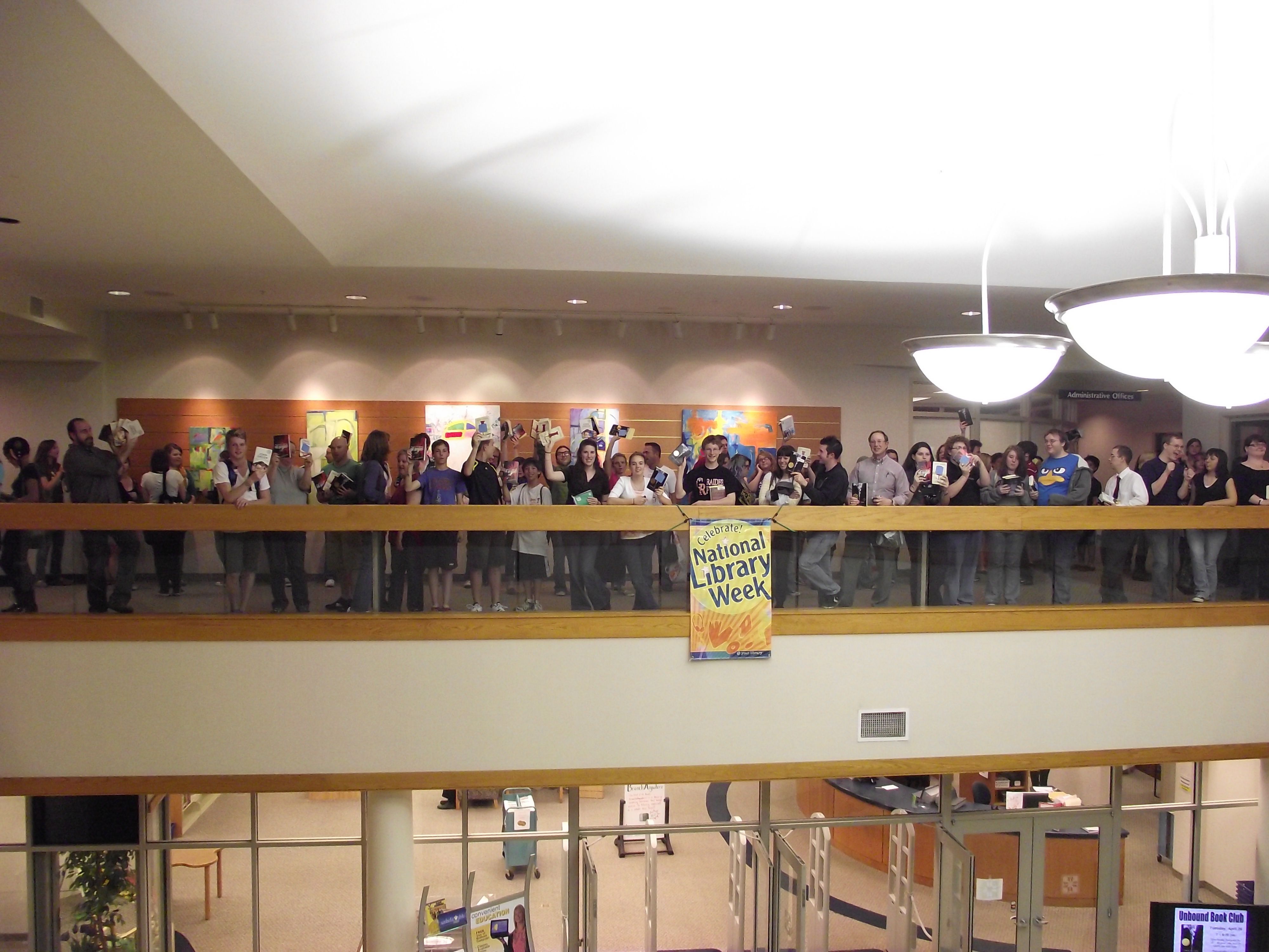 Fans of John Green line the balcony of Plainfield–Guilford Township (Ind.) Public Library to await a program where the teen fiction author spoke about his books and the importance of libraries in the world we live in.