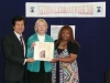 Nancy Burns (center), author of Once Upon a Challenge: Hearing is Believing, joins staffers Michael Tortoro and Tina Herbison from the Braille Institute Library in Los Angeles after her talk during one of several Meet the Author Sessions in honor of National Library Week. A motivational speaker, Burns seeks to challenge society's toward blindness.