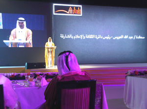 A dignitary addresses the invited guests at the book fair’s opening ceremony, where the front row is reserved for special guests. Photo by Mary Mackay