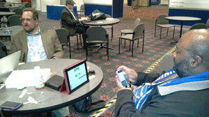 Jason Griffey (left) and Maurice Coleman (right) establish a Google+ Hangout through Google Glass. Photo by Paul Signorelli