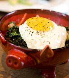 Pig's Ear with crispy kale, pickled cherry peppers and fried egg at The Purple Pig