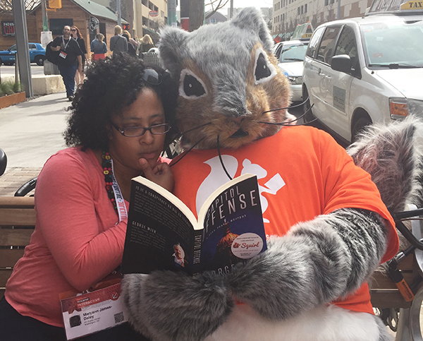 The author and a squirrel take a break from South by Southwest.