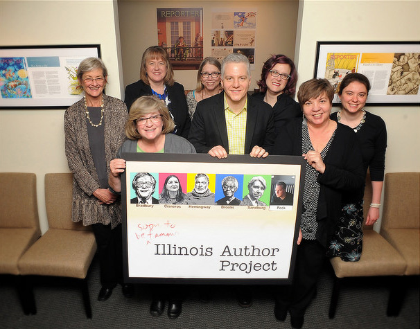 The April announcement of the Soon to Be Famous Author Project winner took place at the Illinois Library Association in Chicago. Front, from left: Denise Raleigh, Michael Alan Peck, and Cris Cigler. Back, from left: Donna Fletcher, Julie Stam, Lucy Tarabour, Nikki Zimmermann, and Jennifer Amling.