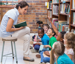 Librarian reads to students