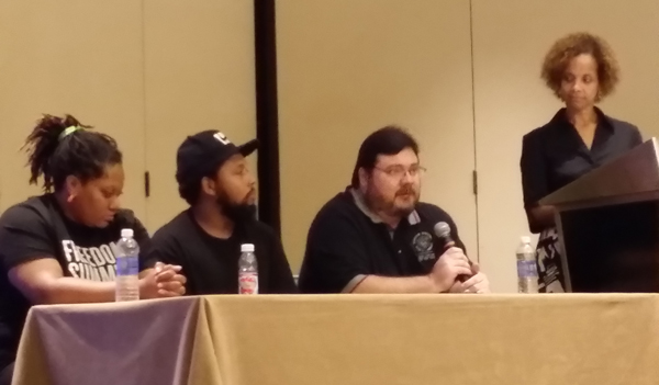 From left: Tasha Burton and Charles Wade, founders of Operation Help or Hush; Scott Bonner, director of the Ferguson Public Library; and moderator Leah Gunning Francis at the Ferguson One Year Later panel during the National Conference of African American Librarians. (Photo credit: Gerald Brooks)