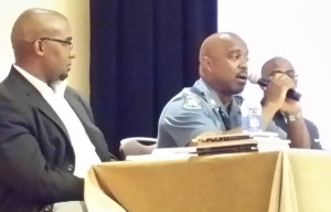 From left: Terrell Carter, former St. Louis police officer and minister; Ron Johnson, Missouri Highway Patrol captain; and Pastor Rodney Francis at the Ferguson One Year Later panel during the National Conference of African American Librarians. (Photo credit: Gerald Brooks)