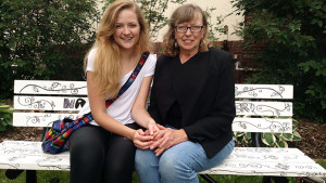 Two local artists who helped create benches for Columbus (Wis.) Public Library’s pilot program.