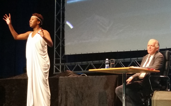 Chi Mhende as Hypatia and David Muller as a journalist in The Hypatiad at IFLA's World Library and Information Congress in Cape Town, South Africa.