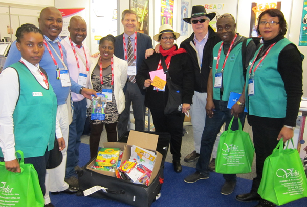 (left to right) Sthembile Mkhize (NWPLS), Anele Moko (head librarian, Tswaing Local Municipality), Ian Segone (NWPLS), Desiree Mtshweni (NWPLS), Michael Dowling (director, ALA International Relations Office), Senovia Welman (in Paul’s former hat), Paul Hover (in his new South African hat), Ernest Bampoe (treasurer, LIASA North West Branch), Joanne Arendse (Cape Peninsula University of Technology and visiting librarian, Virginia Tech).