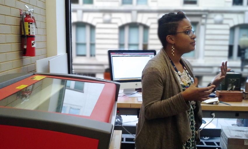 Maryann James-Daley, interim manager of The Labs at DC Public Library, talks about the safety precautions for using the laser cutter.