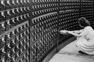 A woman using the card catalog at the main reading room of the Library of Congress, circa 1940.
