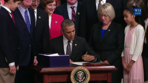 Screenshot of President Obama signing the Every Student Succeeds Act, December 10, 2015.