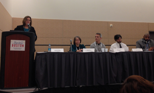 DCWG cochair Carolyn Anthony introduces the panel (from left, DCWG cochair Erika Linke; Mark Kuyper, executive director of the Book Industry Study Group (BISG); Andrew Albanese, senior writer and features editor for Publishers Weekly (PW); and Kelvin Watson, chief innovation and technology officer, Queens (N.Y.) Library).