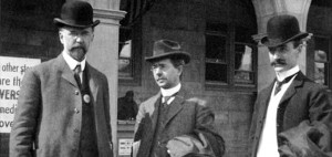ALA officials stand in front of the Hall of Congresses at the St. Louis World’s Fair, 1904: (left to right) ALA President-Elect Ernest Cushing Richardson, former ALA President Reuben Gold Thwaites, and ALA President Herbert Putnam. Richardson wears one of the white buttons that identifies him as an ALA conference attendee. Credit: ALA Archives