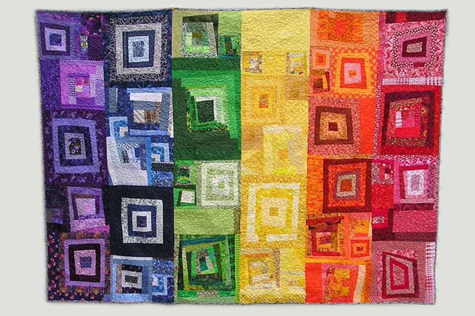 Auctioned at the 2010 Annual Conference in Washington, D.C., this multichromatic quilt coordinated by Rachel Ivy Clarke, a graduate student at the University of Washington in Seattle, uses scraps and other fabrics that may have otherwise been thrown away. Group members were encouraged to contribute blocks in colors of red, orange, yellow, green, blue, and purple.