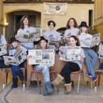Mentors and student reporters for Coal Cracker in Mahanoy City, Pennsylvania, gather for a journalism training session inside the Teen Canteen, an old bank building that used to be a popular hangout in the 1950s and 1960s. Krista Gromalski (back, left) founded the community paper. Photo: Nikki Stetson