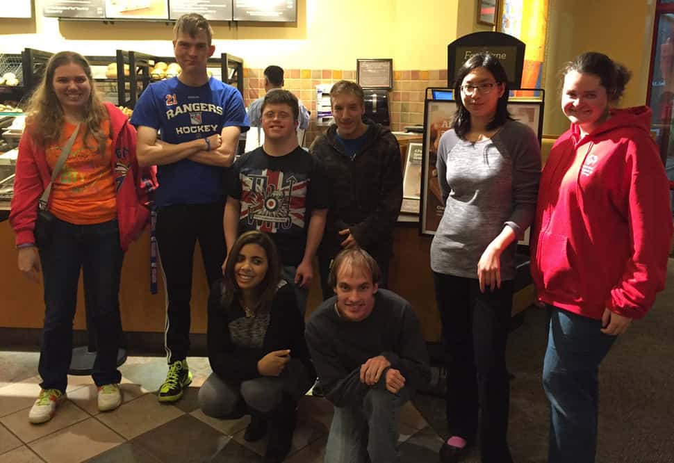 Members of the Scotch Plains (N.J.) Public Library Next Chapter Book Club meet weekly at a local coffee shop with library volunteers.