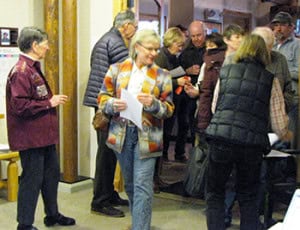 Library trustees and Friends of the Library helped admit the ticketed attendees to the event.