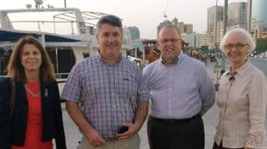 Exploring the sights along Dubai Creek are conference speakers Sari Feldman, Edward Sanchez, James Neal, and Patricia A. Wand.