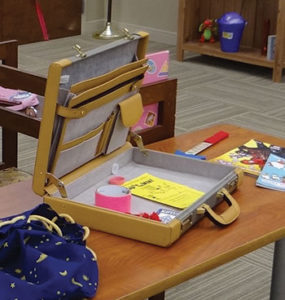 Mahomet (Ill.) Public Library borrowed props, including this double-locking briefcase, from local commercial escape rooms. <span class="credit">Photo: Neal Schlein</span>