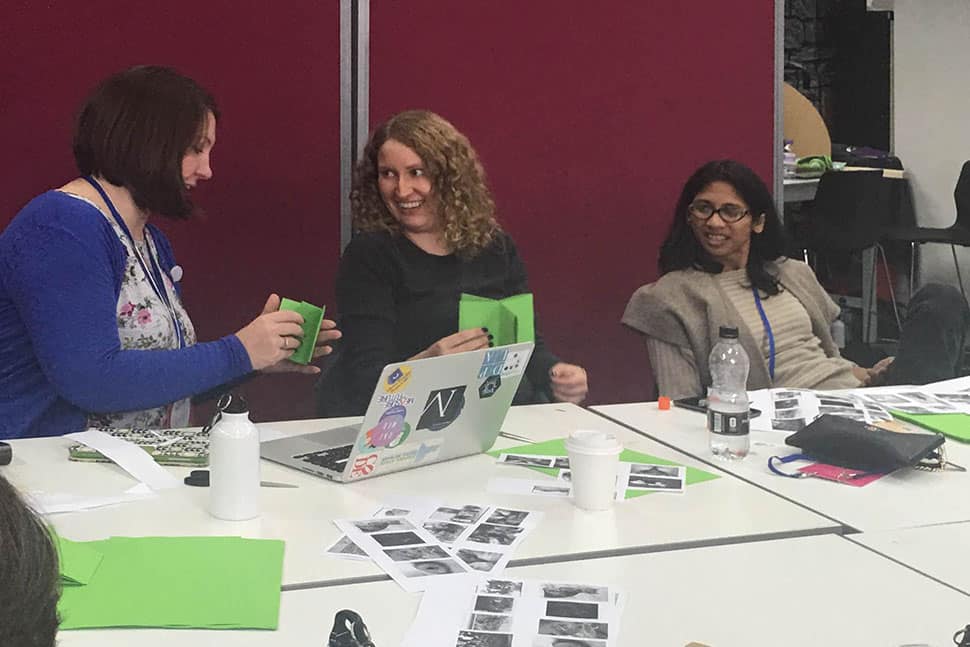 Attendees make one-page zines with open source materials at MozFest, October 28–29 in London.