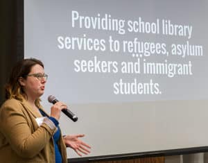 MaryAnne Confer, librarian at Farragut Career Academy in Chicago, shares the types of services and support her school library offers for refugees, asylum seekers, and immigrants. <span class="credit">Photo: Rebecca Lomax/American Libraries</span>