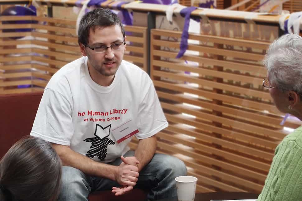 A “book” who identifies as Palestinian converses with two “readers” at a Human Library event hosted by Williams College Libraries in Williams­town, Massachusetts.