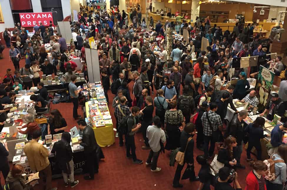 Attendees meet publishers at the Toronto Comic Arts Festival, May 13­–14, 2017.