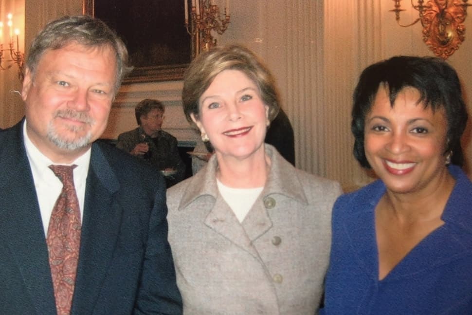 Keith Michael Fiels with then–First Lady Laura Bush and then–ALA President Carla Hayden in 2003.