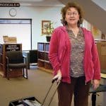 In her position as tribal aide to elders, Judi Bridge helps the senior citizens of Winnebago, Nebraska, make the most of the library.