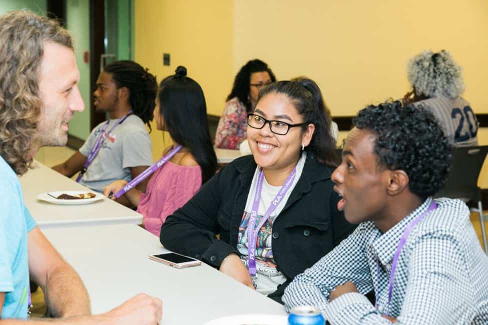 A librarian mentor talks with interns in a speed-mentoring round at the Public Library Association’s Inclusive Internship Initiative kickoff in Washington, D.C. Photo: Tracey Salazar