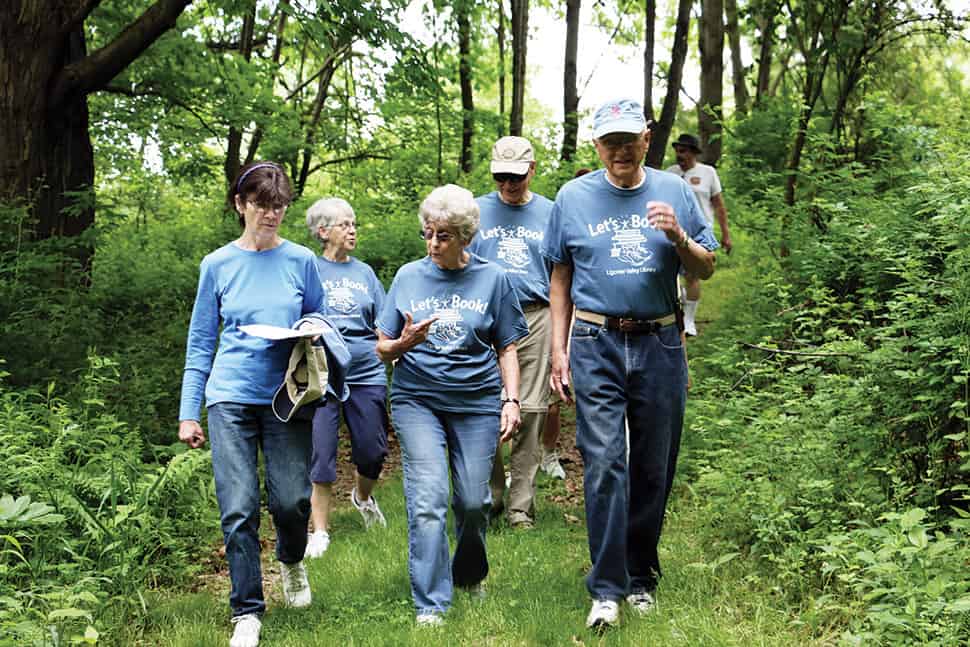 Walkers participate in “Let’s Book,” a reading and exercise program offered by Ligonier Valley (Pa.) Library. Photo: Ligionier Valley (Pa.) Library.