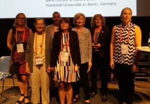 Presenters and moderators at the "More Than Green: Sustainability of Practice, Public Libraries, and the 2030 United Nations Agenda" session. From left: Ritva Hyttinen from Turku University of Applied Sciences (Finland); Veerle Minner Van Neygen, district manager for the Climate Reality Project (Spain); Harri Sahavirta, chair of IFLA's Environment, Sustainability, and Libraries Special Interest Group (ENSULIB); Lo Claesson, manager of the Vaggeryd Public Library (Sweden); Marian Morgan-Bindon, chair of ENSULIB; Petra Hauke, secretary of ENSULIB; and Satu Salmela of Seinäjoki University of Applied Sciences (Finland).